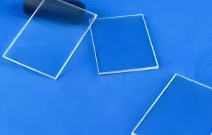 What is the role of quartz glass in optical microscopes